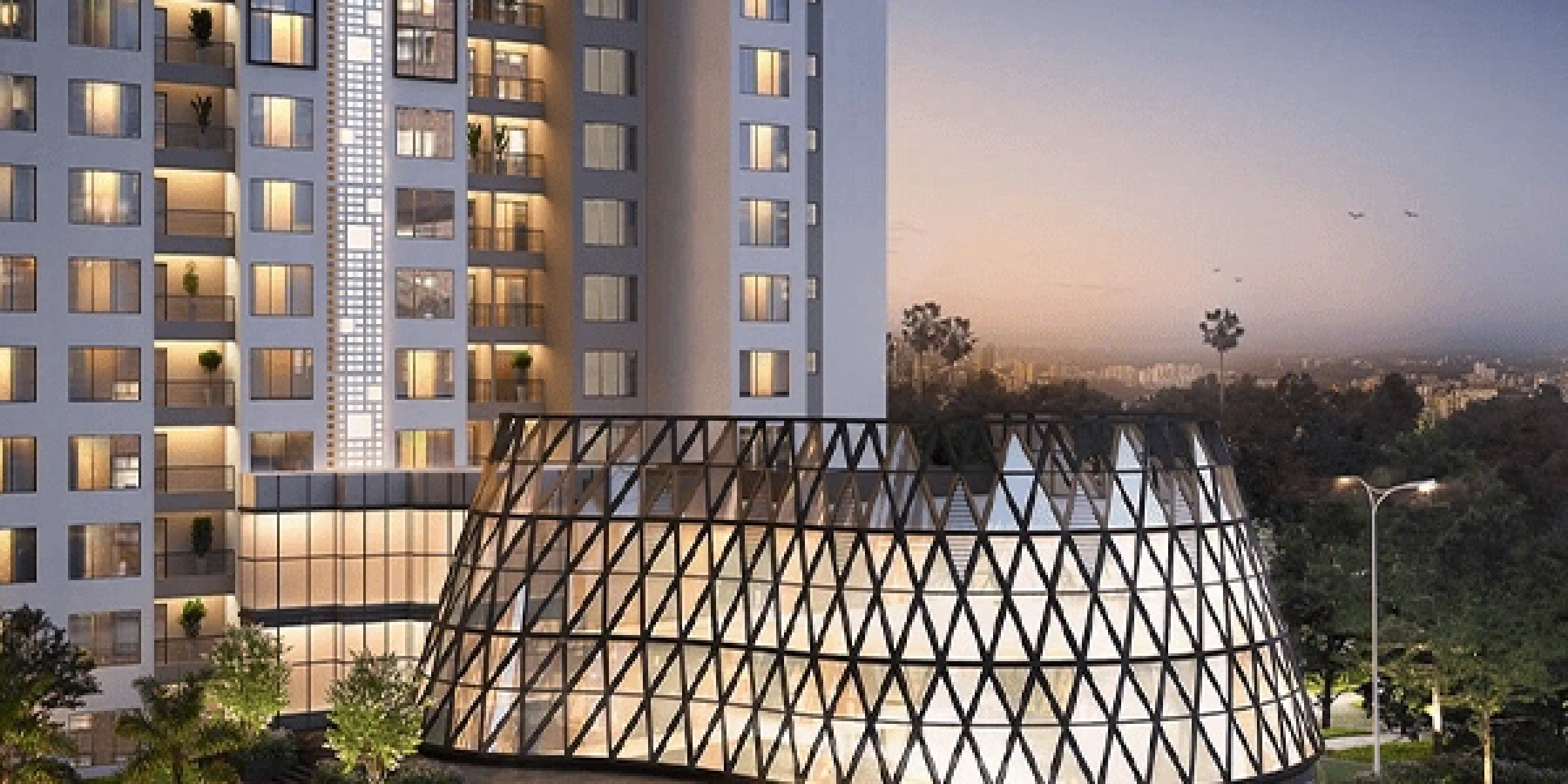 DLF Parivana South modern clubhouse facade by evening
